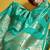 Sea green color satin silk blend handloom weaving saree