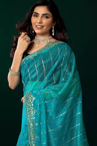Rama net sequence emboidery festive saree with unstitched blouse piece