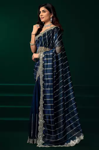 Blue net sequence emboidery festive saree with unstitched blouse piece