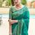 Teal green soft silk blend banarasi jacuard work designer party wear saree with unstitched blouse piece