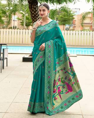 Teal green silk blend banarasi saree with unstitched blouse piece 1