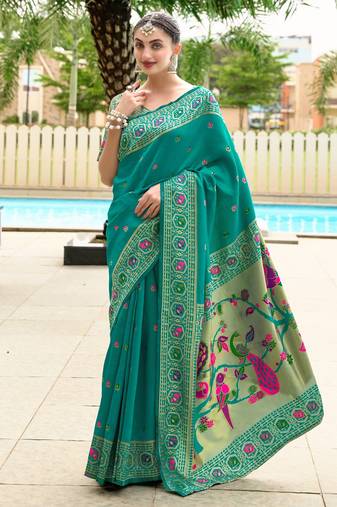 Teal green silk blend banarasi saree with unstitched blouse piece