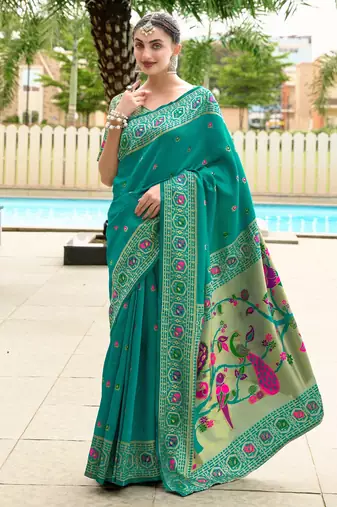 Teal green silk blend banarasi saree with unstitched blouse piece