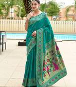 Teal green silk blend banarasi saree with unstitched blouse piece
