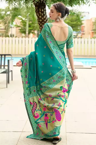Teal green silk blend banarasi saree with unstitched blouse piece