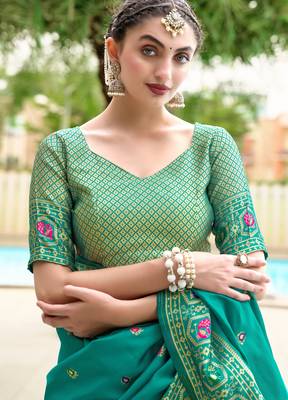 Teal green silk blend banarasi saree with unstitched blouse piece 5