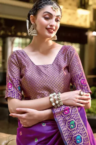 Purple silk blend banarasi saree with unstitched blouse piece