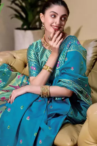 Aqua silk blend banarasi saree with unstitched blouse piece