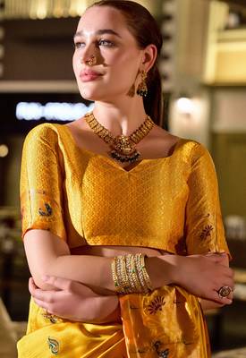 Yellow silk blend banarasi saree with unstitched blouse piece 5