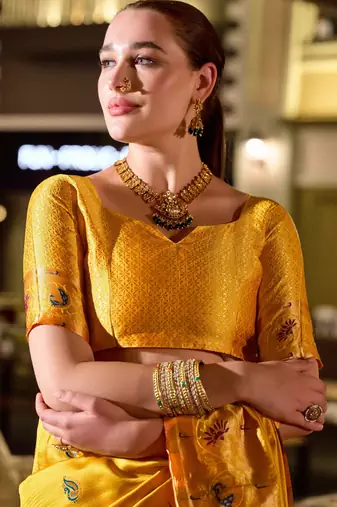 Yellow silk blend banarasi saree with unstitched blouse piece