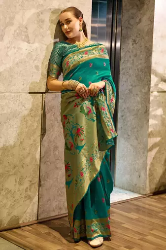Teal green silk blend banarasi saree with unstitched blouse piece