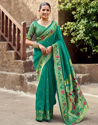 Teal green silk blend banarasi saree with unstitched blouse piece 1