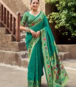 Teal green silk blend banarasi saree with unstitched blouse piece
