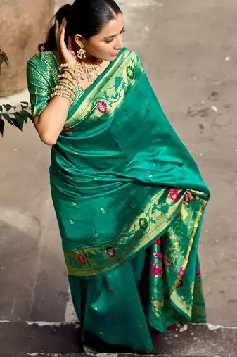 Teal green silk blend banarasi saree with unstitched blouse piece