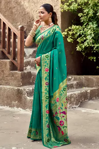 Teal green silk blend banarasi saree with unstitched blouse piece