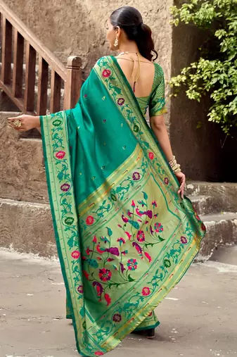 Teal green silk blend banarasi saree with unstitched blouse piece