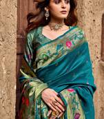 Teal blue silk blend banarasi saree with unstitched blouse piece