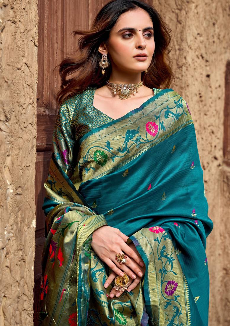 Teal blue soft silk blend banarasi jacuard work designer party wear saree with unstitched blouse piece