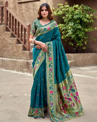 Teal blue silk blend banarasi saree with unstitched blouse piece 2
