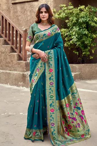 Teal blue silk blend banarasi saree with unstitched blouse piece