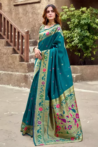 Teal blue silk blend banarasi saree with unstitched blouse piece