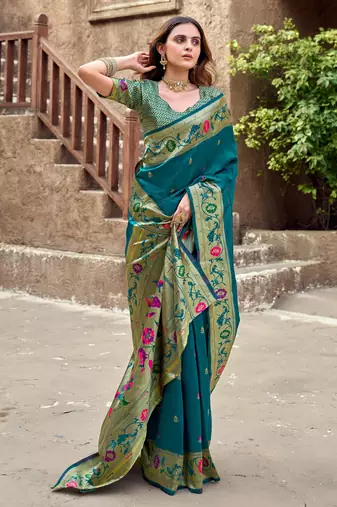 Teal blue silk blend banarasi saree with unstitched blouse piece