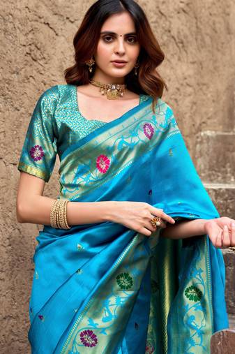 Turquoise soft silk blend banarasi jacuard work designer party wear saree with unstitched blouse piece
