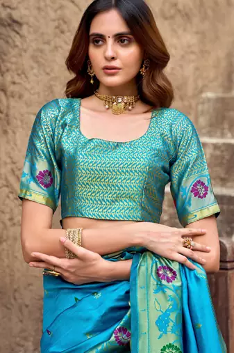Turquoise silk blend banarasi saree with unstitched blouse piece