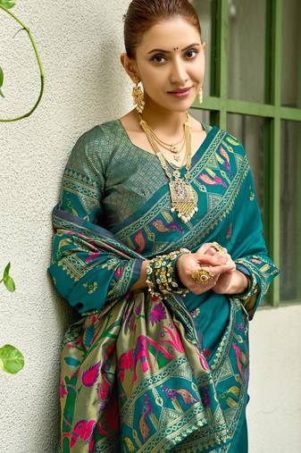 Teal blue silk blend banarasi saree with unstitched blouse piece