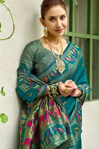 Teal blue silk blend banarasi saree with unstitched blouse piece