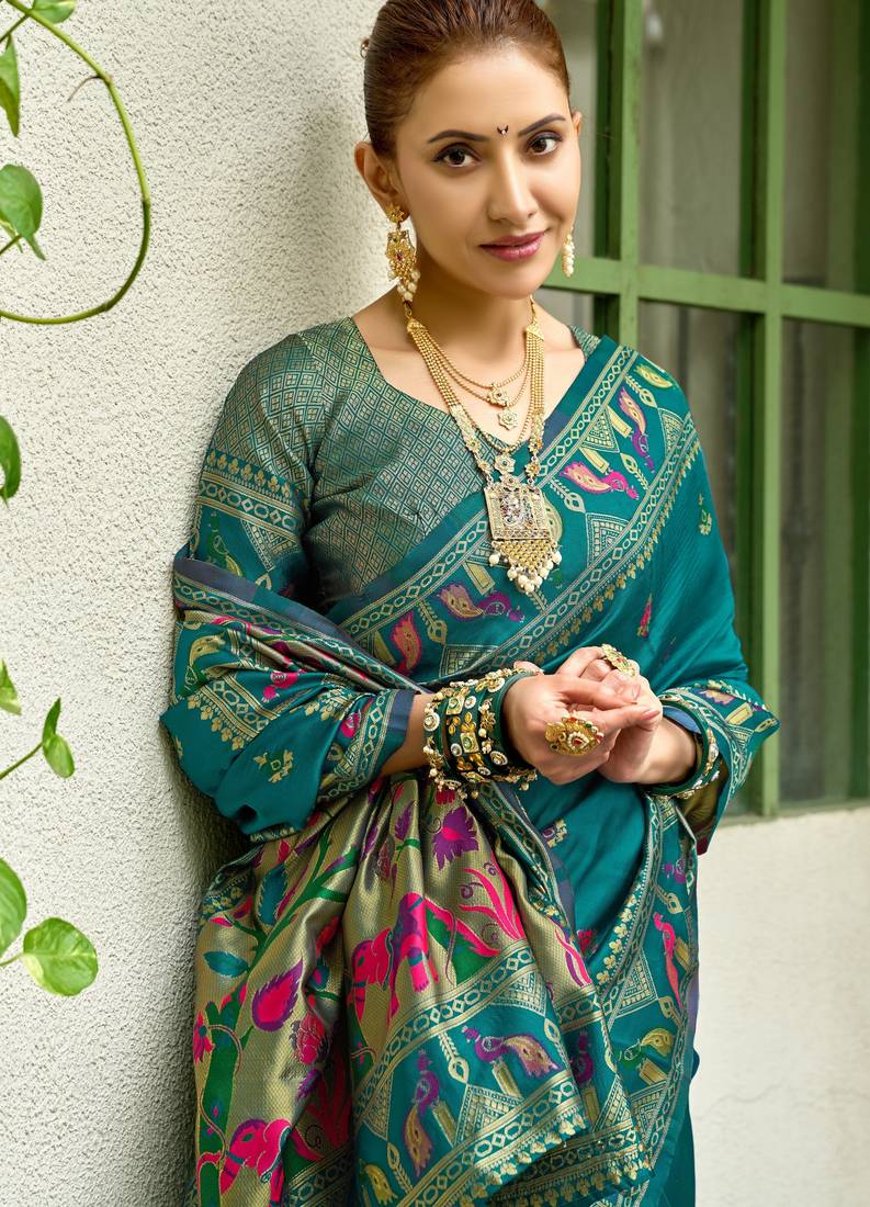 Teal blue soft silk blend banarasi jacuard work designer party wear saree with unstitched blouse piece
