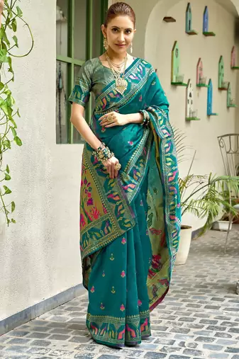 Teal blue silk blend banarasi saree with unstitched blouse piece