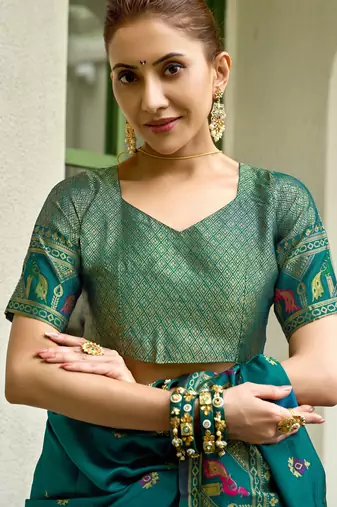 Teal blue silk blend banarasi saree with unstitched blouse piece