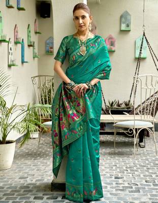 Teal green silk blend banarasi saree with unstitched blouse piece 1