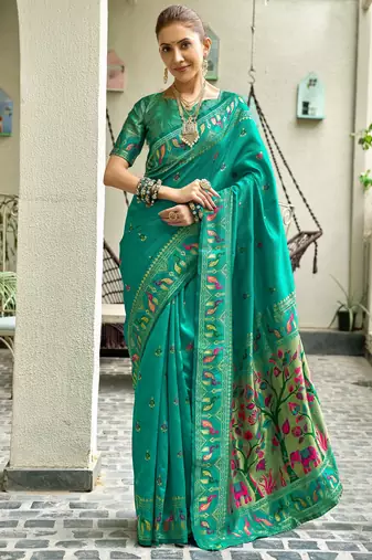 Teal green silk blend banarasi saree with unstitched blouse piece