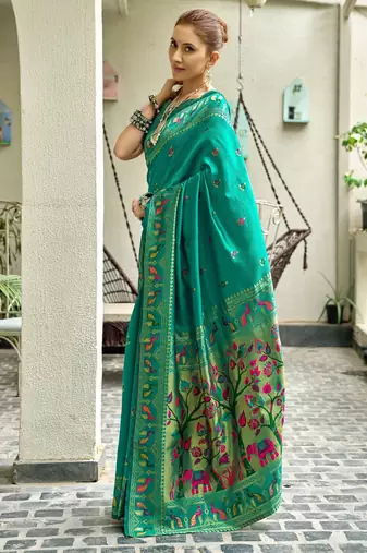 Teal green silk blend banarasi saree with unstitched blouse piece