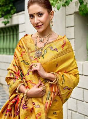 Yellow silk blend banarasi saree with unstitched blouse piece 1