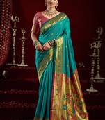 Teal green silk blend banarasi saree with unstitched blouse piece