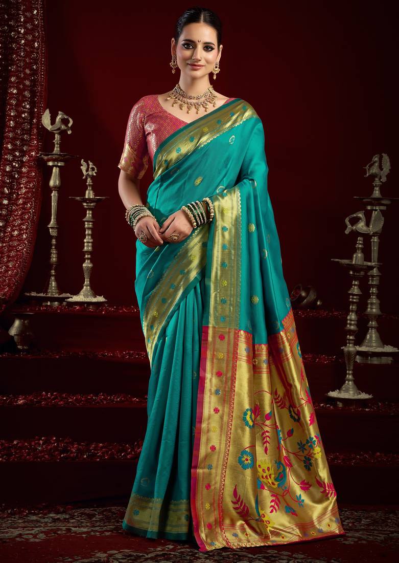 Teal green soft silk blend banarasi jacuard work designer party wear saree with unstitched blouse piece