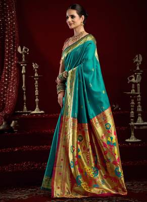 Teal green silk blend banarasi saree with unstitched blouse piece 2
