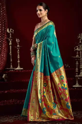 Teal green silk blend banarasi saree with unstitched blouse piece