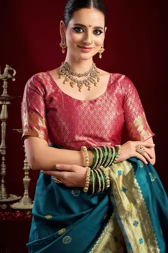 Teal blue silk blend banarasi saree with unstitched blouse piece