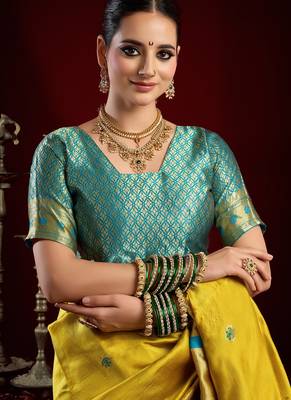Yellow silk blend banarasi saree with unstitched blouse piece 5
