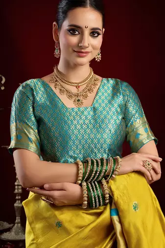 Yellow silk blend banarasi saree with unstitched blouse piece