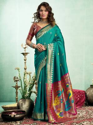 Teal green silk blend banarasi saree with unstitched blouse piece 1