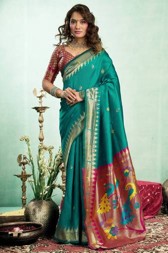 Teal green silk blend banarasi saree with unstitched blouse piece