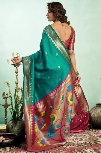 Teal green silk blend banarasi saree with unstitched blouse piece