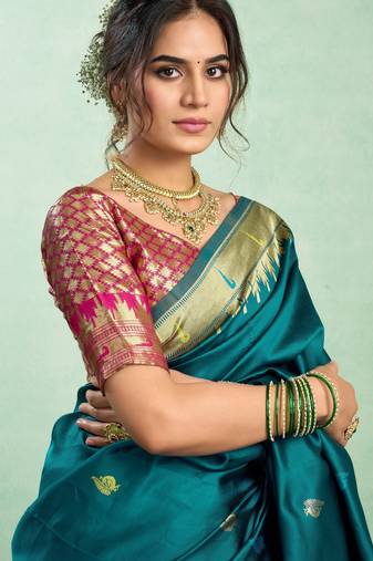 Teal blue silk blend banarasi saree with unstitched blouse piece