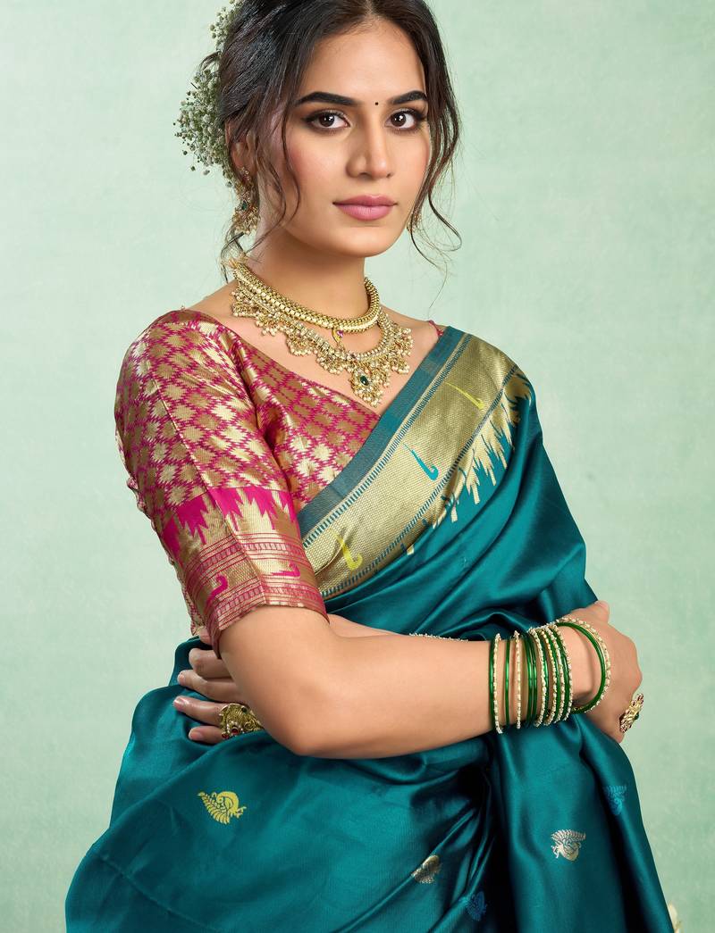 Teal blue soft silk blend banarasi jacuard work designer party wear saree with unstitched blouse piece