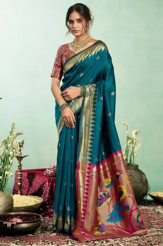 Teal blue silk blend banarasi saree with unstitched blouse piece